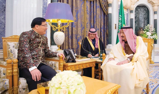 King Salman receives outgoing Chinese Ambassador Li Huaxin at Al-Yamamah Palace in Riyadh on Sunday. (SPA)