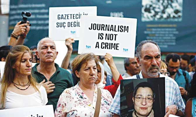 Protesters rally against the arrest of media activists in Istanbul, Turkey. (Reuters)