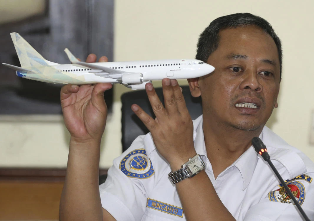 In this Nov. 28, 2018, file photo, National Transportation Safety Committee investigator Nurcahyo Utomo holds a model of an airplane during a press conference on the committee's preliminary findings on their investigation on the crash of Lion Air flight 610, in Jakarta, Indonesia. (AP)
