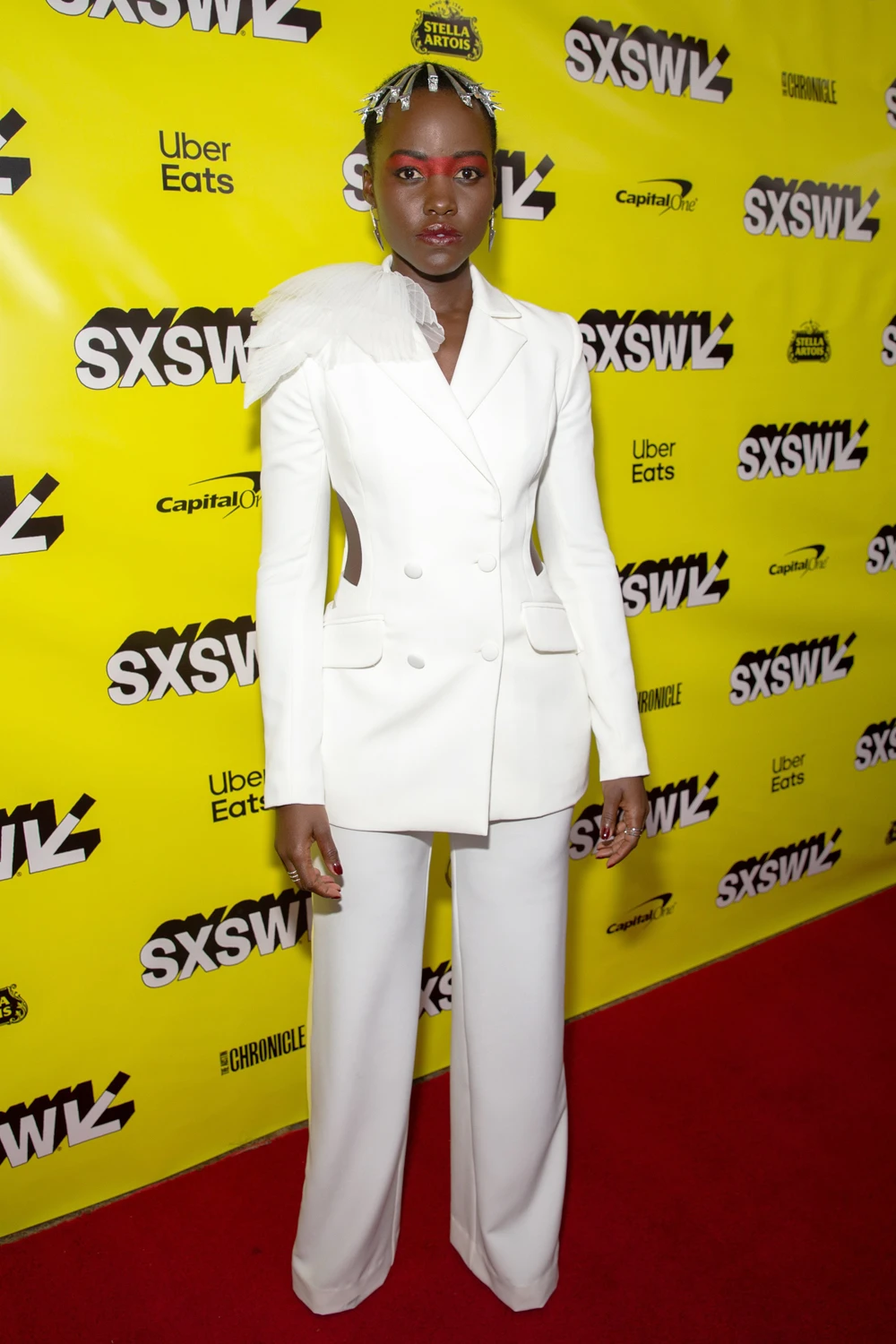 Nyong’o wore a suit by Saudi label Honayda. (AFP)