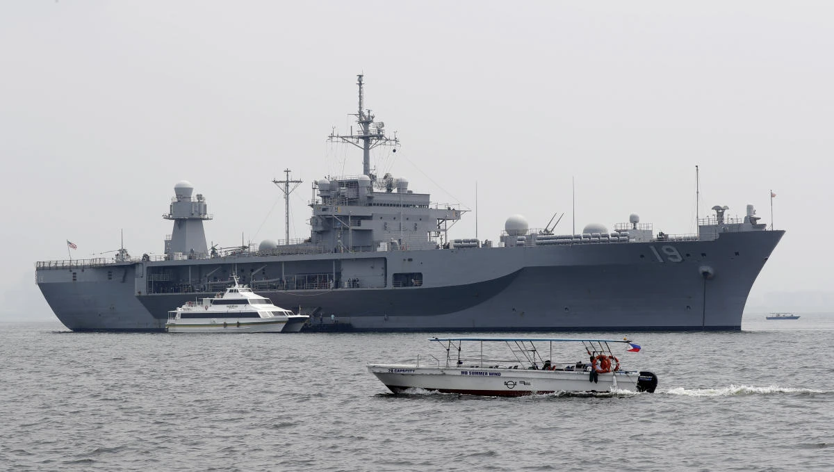 The USS Blue Ridge (LCC-19), the US 7th Fleet Flagship, is anchored off Manila Bay west of Manila, Philippines for a routine port call Wednesday, March 13, 2019. (AP)