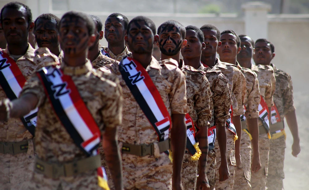 Yemeni fighters from the Popular Resistance Committees, supporting forces loyal to Yemen's internationally-recognized government, take part in a graduation ceremony in the country's third city Taez, on March 11, 2019. (AFP)