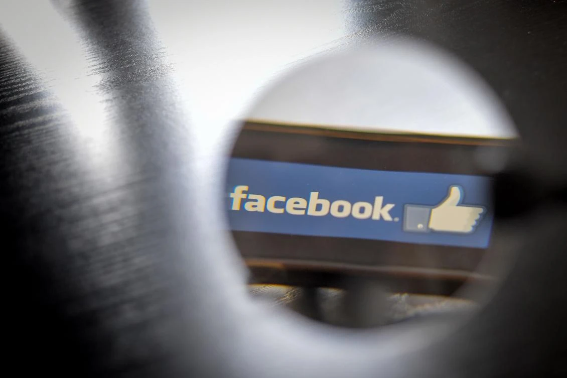 A day not to ‘like’ for Facebook, hit by outage, criminal probe