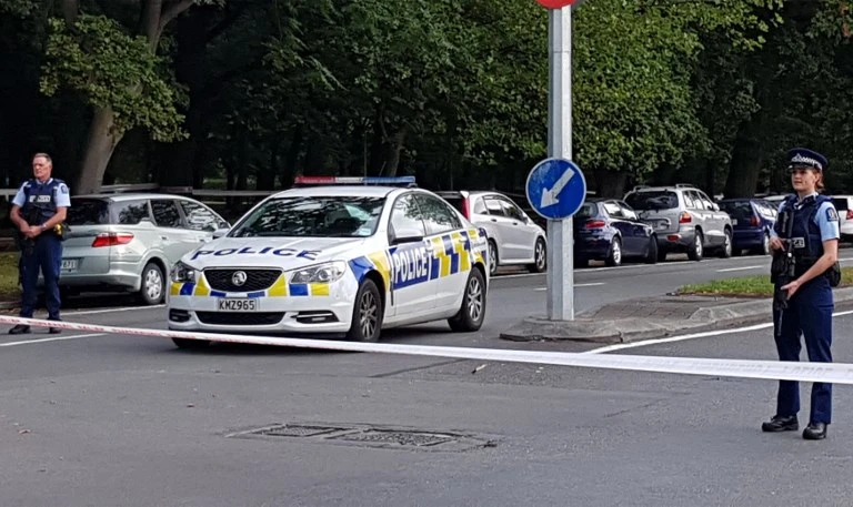 Police officers cordon off the area close to the mosque after a gunman filming himself firing at worshippers inside in Christchurch on March 15, 2019. (AFP)