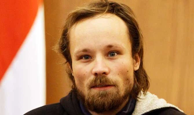 In this file photo taken on March 5, 2013 German independent journalist Billy Six, whose employers said had been out of contact for almost four months, is pictured during a press conference in Damascus were he was handed over to the Russian embassy by Syrian Deputy Foreign Minister Faisal Muqdad. (AFP)