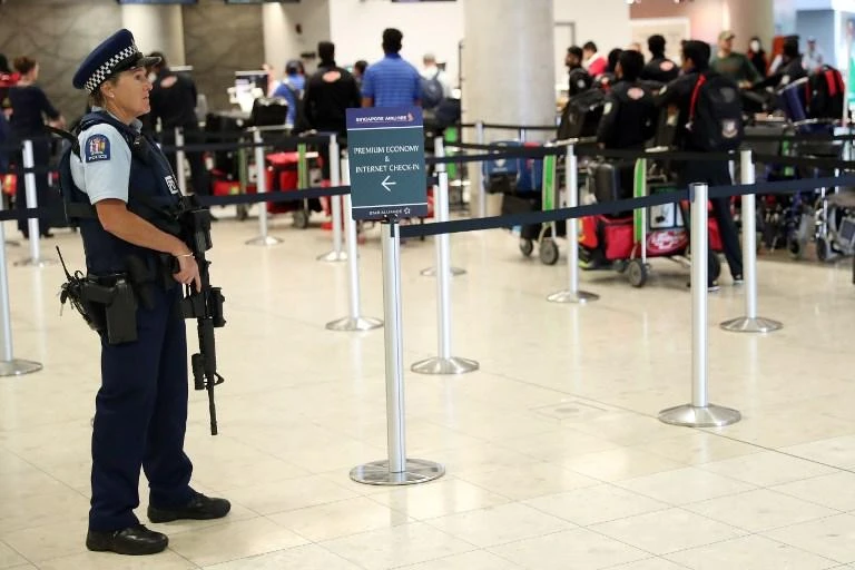 New Zealand police closed Dunedin airport late Sunday after a suspicious device was reported on the airfield. Armed police have been keeping a tight security on public facilities including Christchurch airport, above. (AFP)