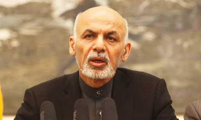 Afghanistan's President Ashraf Ghani, center, speaks during a press conference at the presidential palace in Kabul, Afghanistan Wednesday, Dec. 10, 2014. (AP)