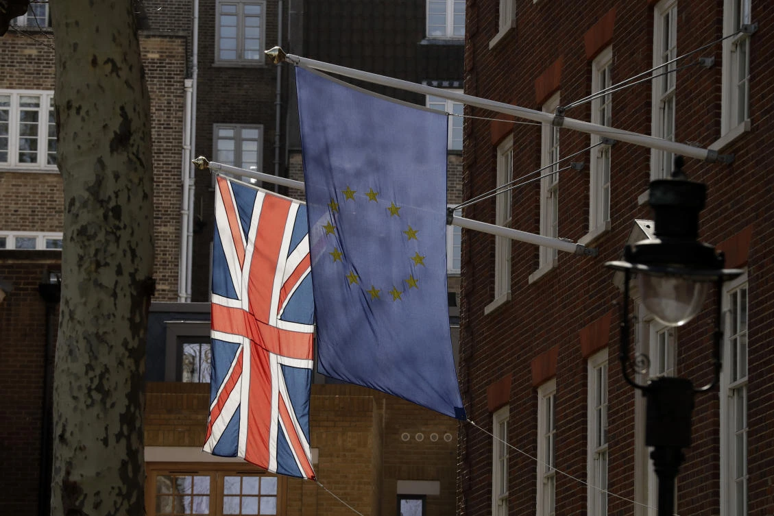 A European flag and a British Union flag hang outside Europe House, the European Parliament's British offices in London, Monday, March 18, 2019. (AP)