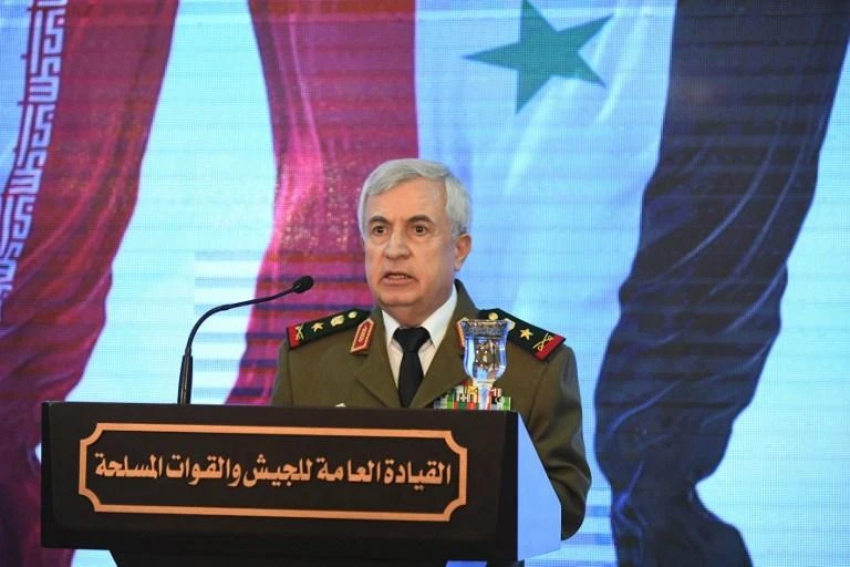 Syrian Defense Minister Ali Ayoub, above, said the government is determined to return the Kurdish-led areas. (AFP)