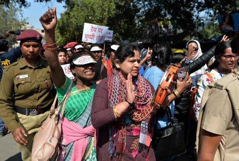 Women shout slogans as they take part in a protest against rape and violence against women in New Delhi on March 6, 2019. (AFP)
