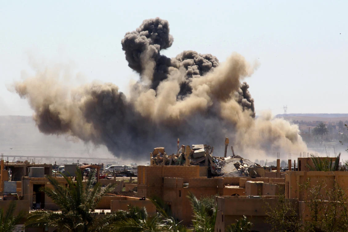 Smoke rises from the last Daesh stronghold in the village of Baghouz, Deir Ezzor province, Syria. (Reuters)