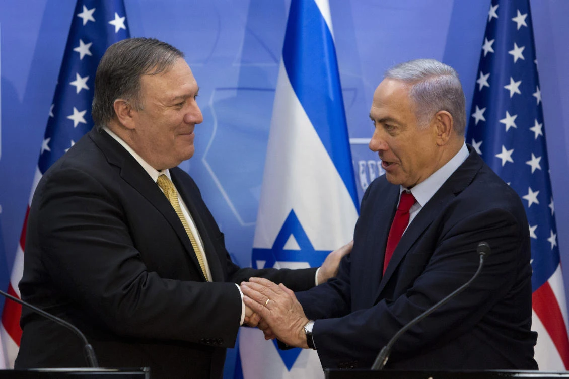 Mike Pompeo shakes hands with Benjamin Netanyahu during their meeting at the Prime Minister's office in Jerusalem on Wednesday. (AP)