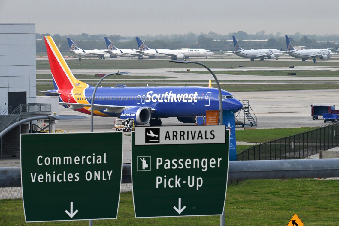 Boeing 737 MAX 8 aircraft from American carriers Southwest, foreground, and United Airlines are grounded at William P. Hobby Airport in Houston, Texas. (Reuters)