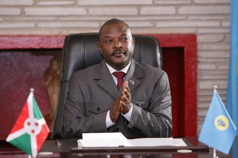 Three girls are accused of defacing photographs of President Pierre Nkurunziza, above, in textbooks and could face up to five years in prison if found guilty. (AFP)