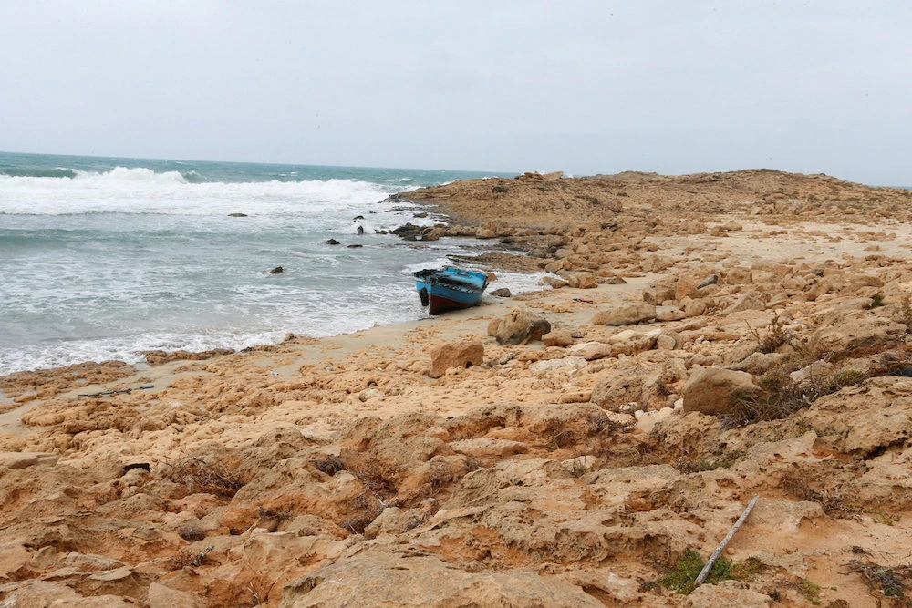 A boat used by migrants is seen near the western town of Sabratha, Libya March 19, 2019. (Reuters)