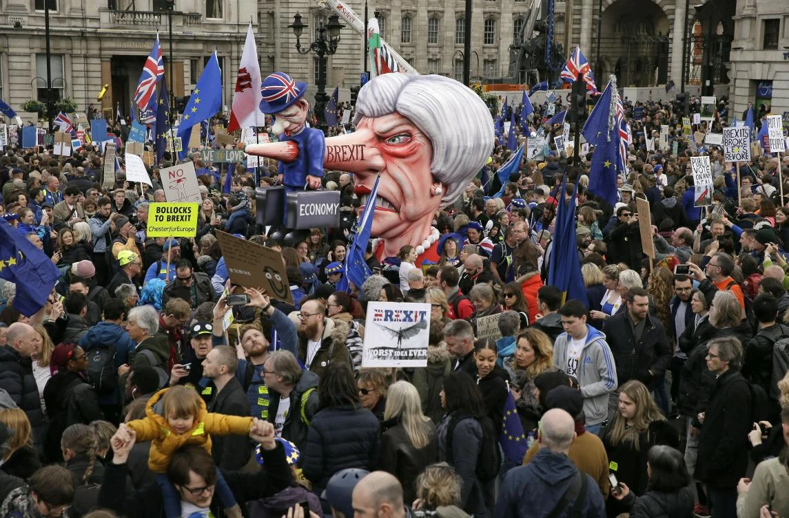 An effigy of British Prime Minister Theresa May is wheeled through Trafalgar Square during a Peoples Vote anti-Brexit march in London, Saturday, March 23, 2019. (AP)