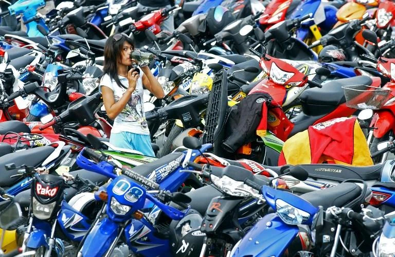 Philippine President Rodrigo Duterte signed the measure into law this month, requiring all licensed motorbikes to display bigger front and rear plates. (AFP file photo)