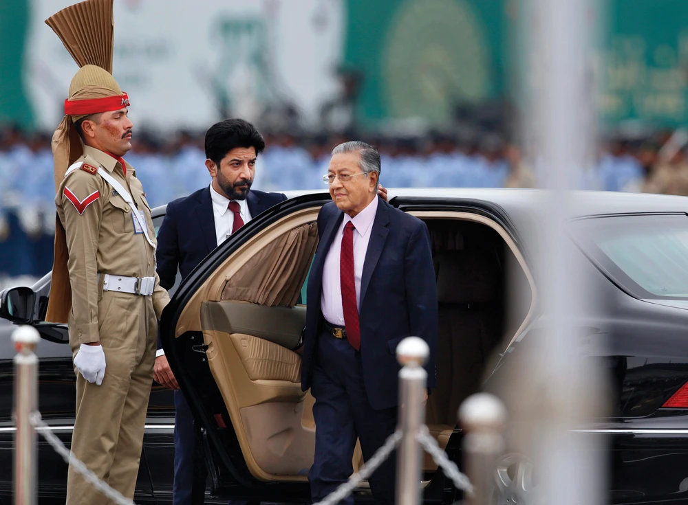 Malaysian Prime Minister Mahathir Mohamad arrives to attend Pakistan National Day parade in Islamabad on March 23, 2019. (AP)
