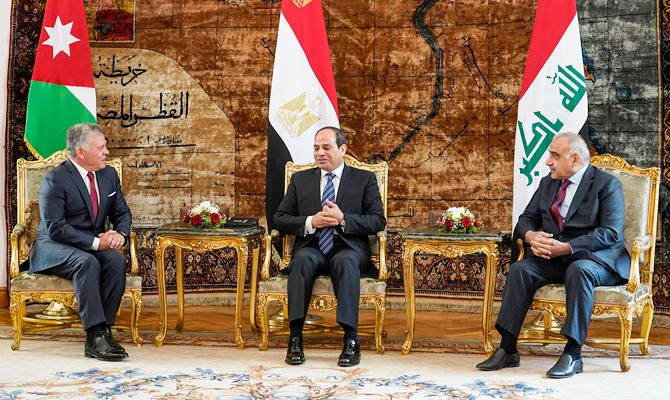 A handout photo released by the Jordanian Royal Palace on March 24, 2019 shows Jordan's King Abdullah II (L) and Iraq's Prime Minister Adel Abdel Mahdi (R) meeting with Egypt's President Abdel Fattah al-Sisi (C) at the presidential palace in the Egyptian capital Cairo. (AFP)
