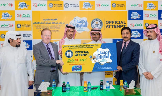 LuLu KSA Director Shehim Mohammed, GCC Head Modern Trade Almarai Joe Obrien, Regional GM Almarai Mohammed A. Alrashed, and LuLu officials Yasser Al-Qahatai, Eid bin Nazar Al-Anaizi and Abdulla Hamdan Anaizi at the launch event.