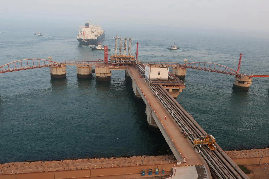 A liquified natural gas (LNG) tanker leaves the dock after discharge at PetroChina's receiving terminal in Dalian, Liaoning province, China July 16, 2018. (Reuters)