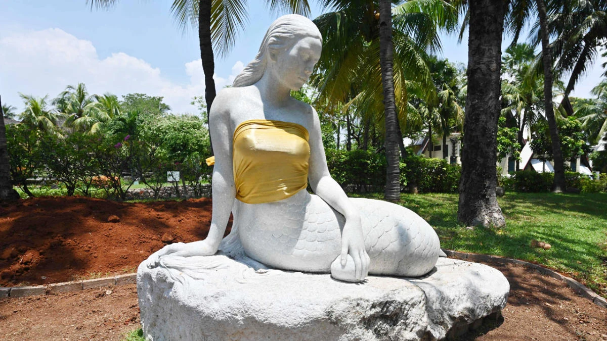 This photo taken at the Ancol amusement park in Jakarta on March 26, 2019 shows a statue of a mermaid with golden tube tops. (AFP)