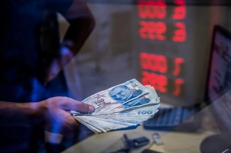 Turkish President Recep Tayyip Erdogan blames the lira's volatility on US currency attacks. (AFP/File)
