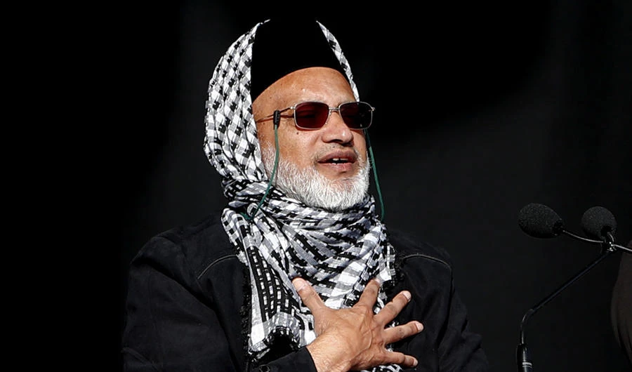 Farid Ahmed, one of the survivors, speaks during the national remembrance service for victims of the mosque attacks, at Hagley Park in Christchurch, New Zealand, on March 29, 2019. (REUTERS/Edgar Su)