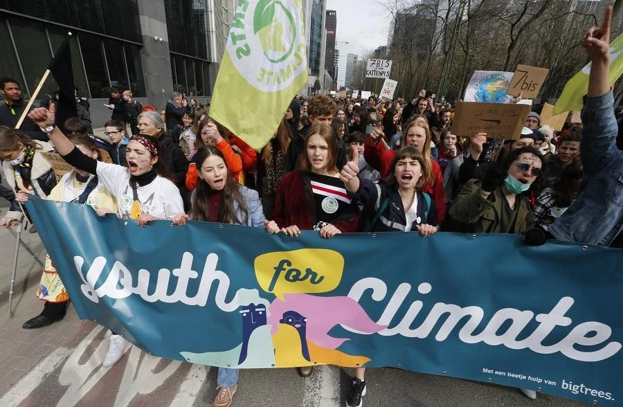 One placard at the protest read: “I’ll go to school if you keep the planet cool.” (File/AFP)