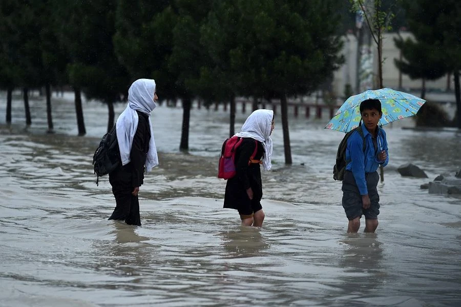 Two days of flooding that started on Thursday killed 12 people in Jawzjan and two in Badghis, provinces that border Turkmenistan. (File/AFP)
