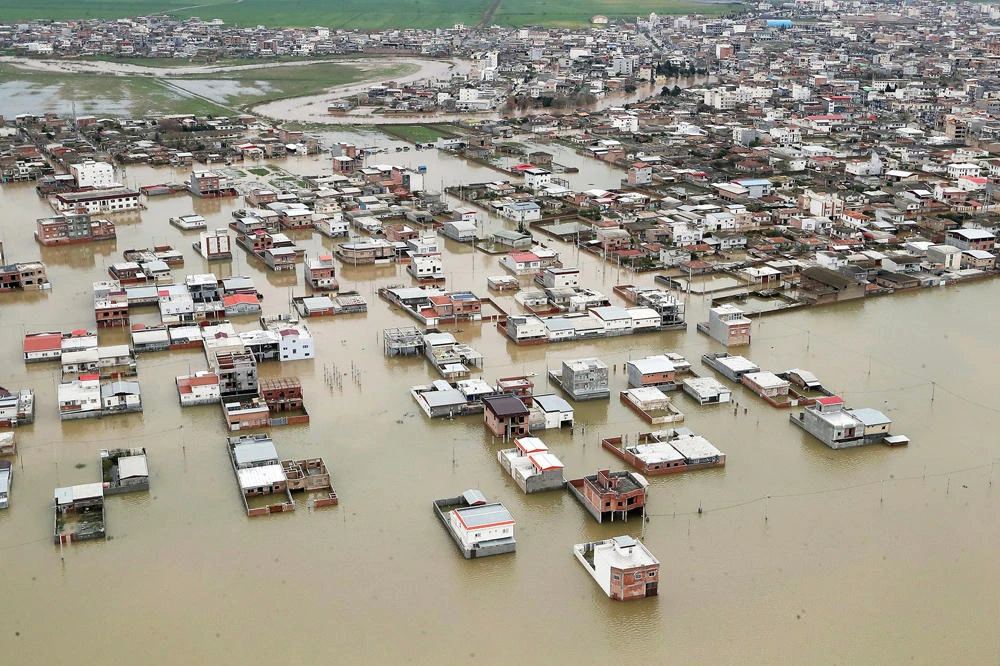 Iran evacuates flood-threatened villages after heavy rains kill dozens