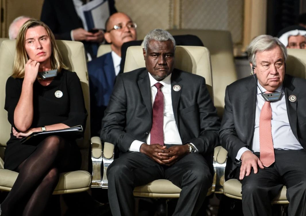 The African Union will host a “reconciliation” conference in July aimed at uniting Libya’s political rivals, AU commission chief Moussa Faki (C) said late Saturday. (AFP)