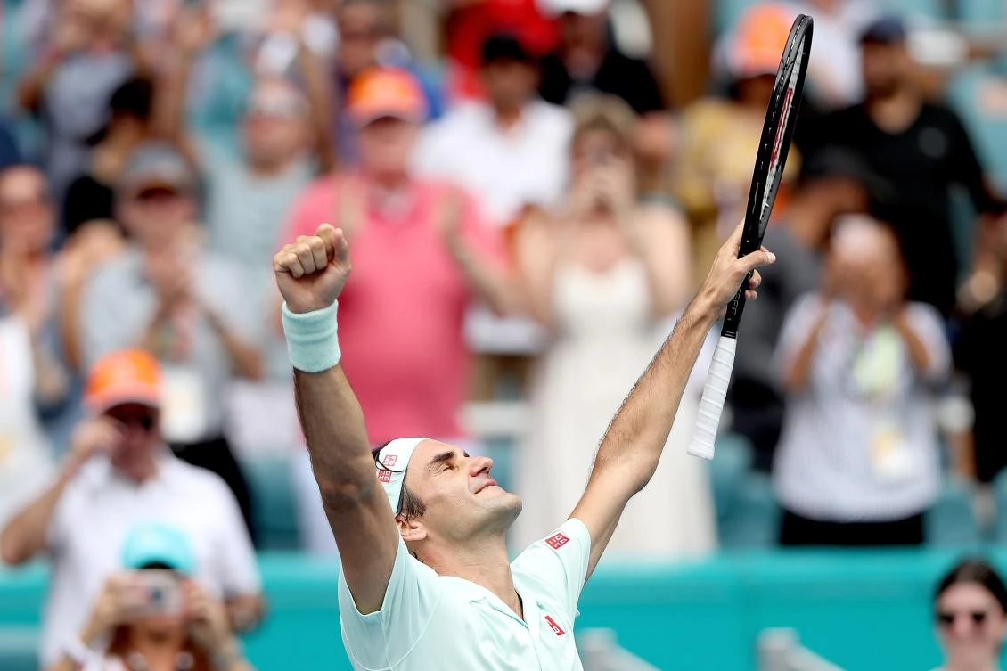 Roger Federer of Switzerland celebrates his win against John Isner during the men's final of the Miami Open. (AFP)