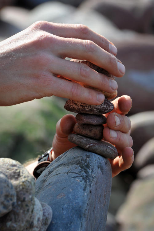 A competitor creates their sculpture in the European Stone Stacking Championships 2019 in Dunbar, Scotland, on April 21, 2019. The European Stone Stacking Championships are Europe’s largest championships for all Stone Stacking and Rock Balancing artists and practitioners. Stackers compete in four competitions creating sculptures using stones and balancing them using only the force of gravity. The overall winner receives a trip to llano Earth Art Festival and World Stone Balancing competition 2020. / AFP / Andy Buchanan