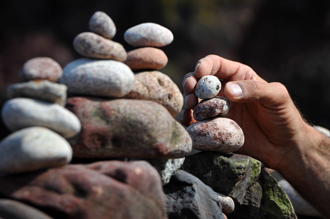 A picture shows a balanced sculpture built during the European Stone Stacking Championships 2019 in Dunbar, Scotland, on April 21, 2019. The European Stone Stacking Championships are Europe’s largest championships for all Stone Stacking and Rock Balancing artists and practitioners. Stackers compete in four competitions creating sculptures using stones and balancing them using only the force of gravity. The overall winner receives a trip to llano Earth Art Festival and World Stone Balancing competition 2020. / AFP / Andy Buchanan