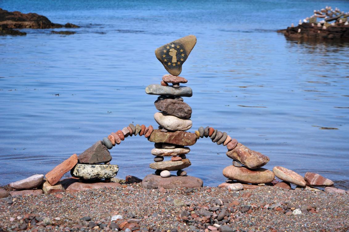 A picture shows a balanced sculpture built during the European Stone Stacking Championships 2019 in Dunbar, Scotland, on April 21, 2019. The European Stone Stacking Championships are Europe’s largest championships for all Stone Stacking and Rock Balancing artists and practitioners. Stackers compete in four competitions creating sculptures using stones and balancing them using only the force of gravity. The overall winner receives a trip to llano Earth Art Festival and World Stone Balancing competition 2020. / AFP / Andy Buchanan