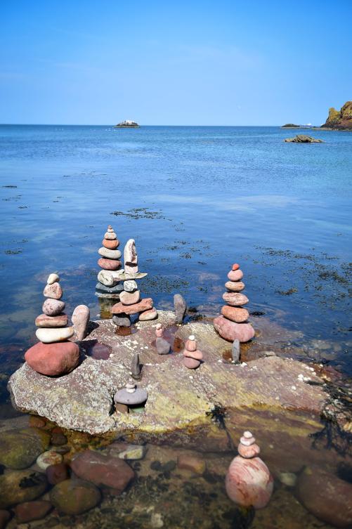 A picture shows a balanced sculpture built during the European Stone Stacking Championships 2019 in Dunbar, Scotland, on April 21, 2019. The European Stone Stacking Championships are Europe’s largest championships for all Stone Stacking and Rock Balancing artists and practitioners. Stackers compete in four competitions creating sculptures using stones and balancing them using only the force of gravity. The overall winner receives a trip to llano Earth Art Festival and World Stone Balancing competition 2020. / AFP / Andy Buchanan