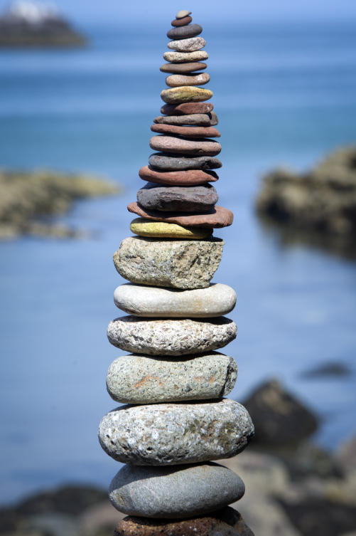 A picture shows a balanced sculpture built during the European Stone Stacking Championships 2019 in Dunbar, Scotland, on April 21, 2019. The European Stone Stacking Championships are Europe’s largest championships for all Stone Stacking and Rock Balancing artists and practitioners. Stackers compete in four competitions creating sculptures using stones and balancing them using only the force of gravity. The overall winner receives a trip to llano Earth Art Festival and World Stone Balancing competition 2020. / AFP / Andy Buchanan