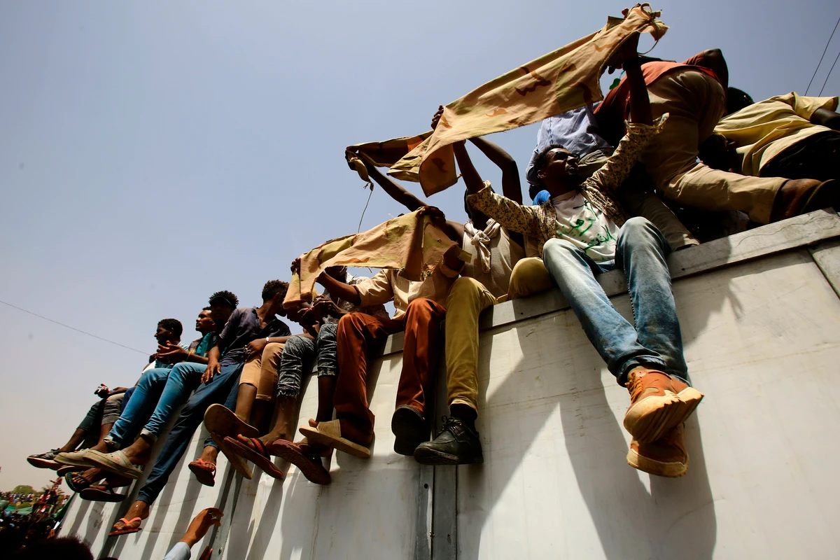 Sudanese demonstrators gather in a street in central Khartoum. (AFP)