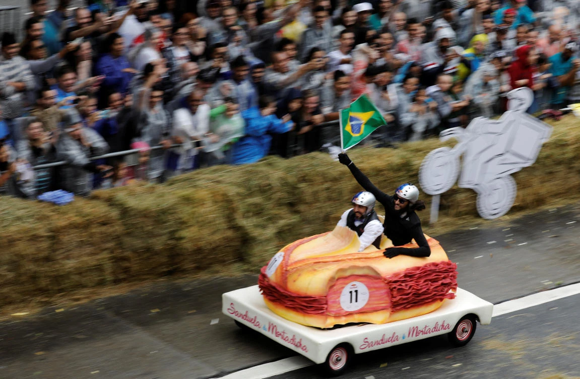Competitors ride a home-made vehicle on a downhill track during the Red Bull Soapbox Race in Sao Paulo, Brazil, April 14, 2019. REUTERS/Nacho Doce