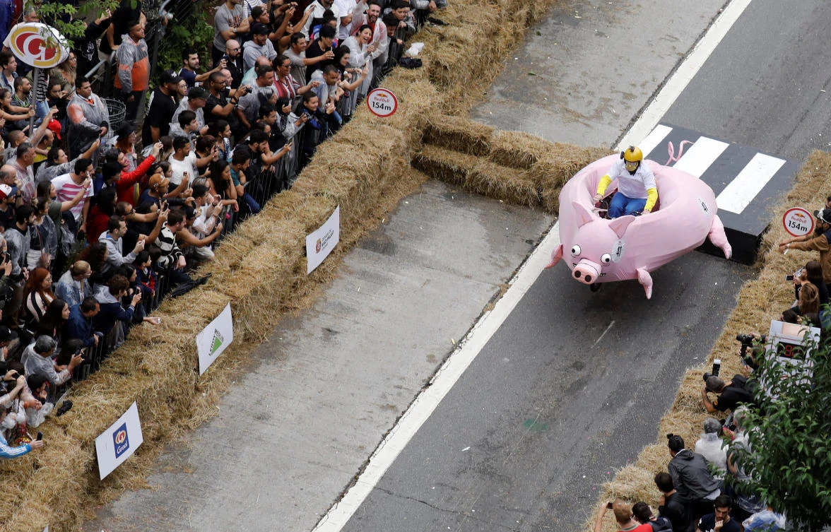 A competitor rides a home-made vehicle on a downhill track during the Red Bull Soapbox Race in Sao Paulo, Brazil, April 14, 2019. REUTERS/Nacho Doce