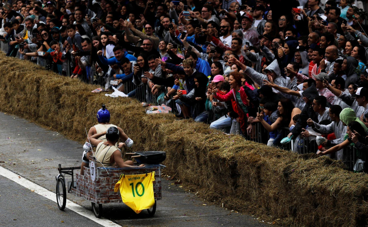 Competitors ride a home-made vehicle on a downhill track during the Red Bull Soapbox Race in Sao Paulo, Brazil, April 14, 2019. REUTERS/Nacho Doce