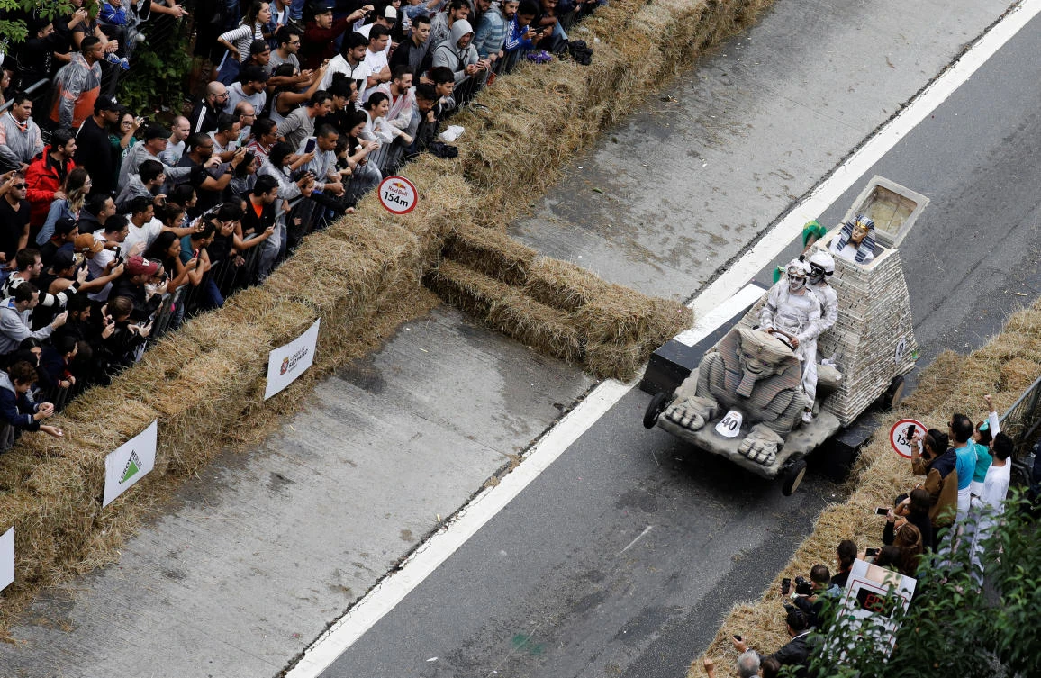 Competitors ride a home-made vehicle on a downhill track during the Red Bull Soapbox Race in Sao Paulo, Brazil, April 14, 2019. REUTERS/Nacho Doce