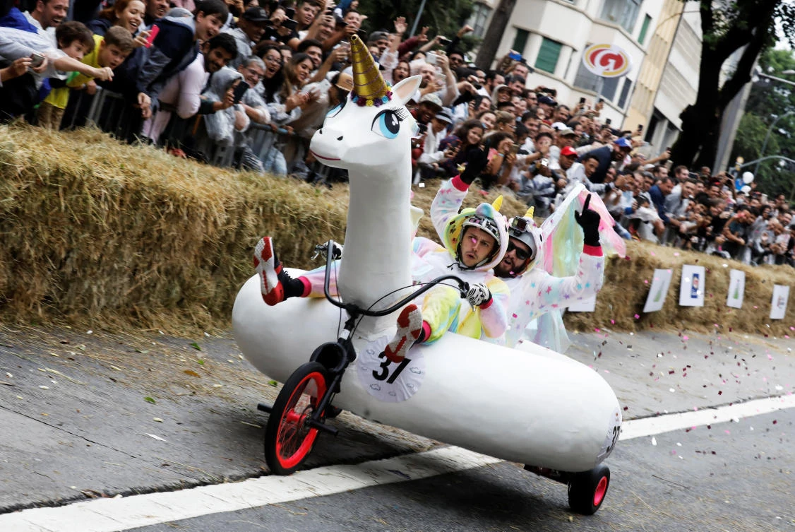 Competitors ride a home-made vehicle on a downhill track during the Red Bull Soapbox Race in Sao Paulo, Brazil, April 14, 2019. REUTERS/Nacho Doce