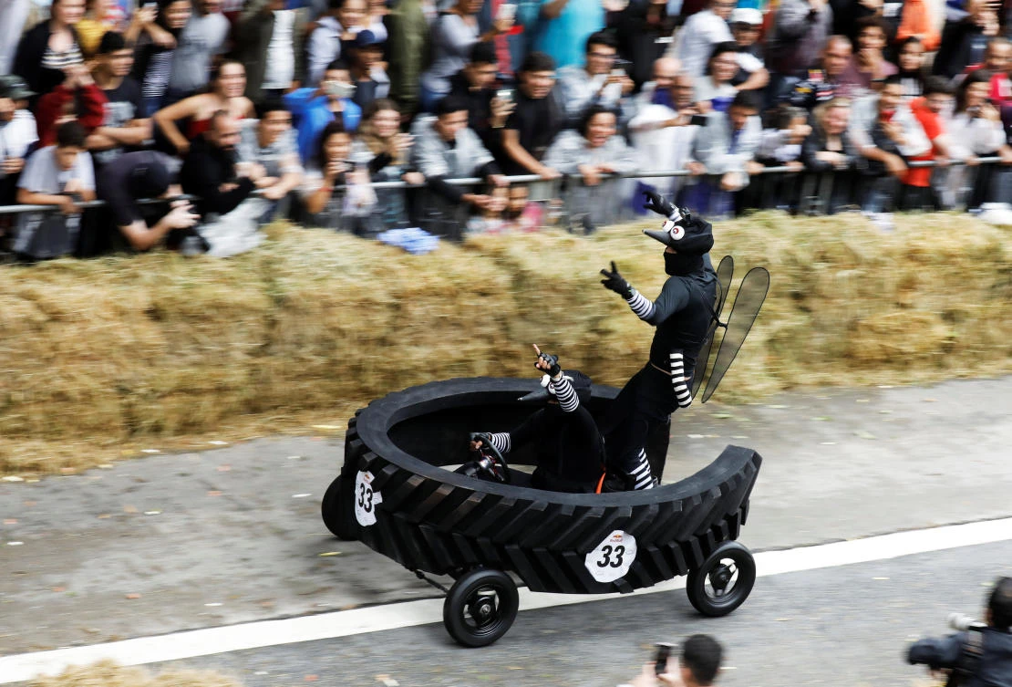 Competitors ride a home-made vehicle on a downhill track during the Red Bull Soapbox Race in Sao Paulo, Brazil, April 14, 2019. REUTERS/Nacho Doce