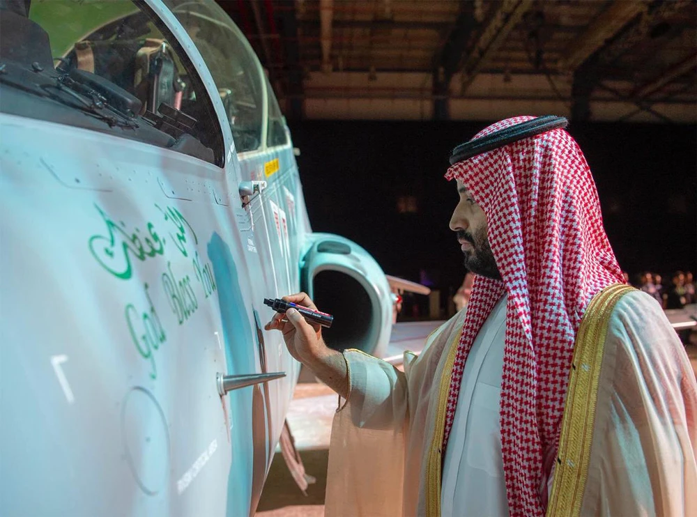 Crown Prince Mohammed bin Salman Crown Prince Mohammed bin Salman inscribes his signature on the first Saudi-assembled Hawk aircraft at the launching event in Dhahran on March 31, 2019. (SPA)
