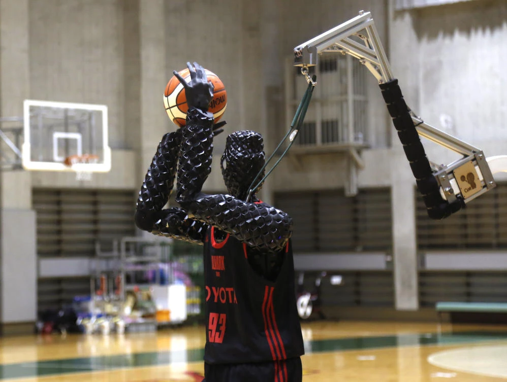 A Japanese basketball player said if Cue 3 could learn more tricks he might accept him on the team. (AP)