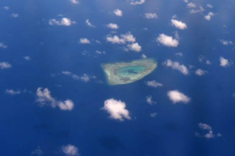 Above, an aerial view of a reef in the disputed Spratly islands in this April 21, 2017. (AFP)