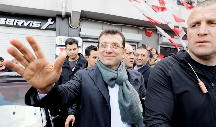 Ekrem Imamoglu, a top opposition candidate for mayor of Istanbul, greets his supporters in Istanbul. (Reuters)