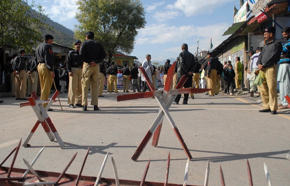 Pakistani police officers stand guard at Chakoti post situated at the line of control between Pakistan and Indian Kashmirs, in Pakistan in this October 2014 file photo. (AP)